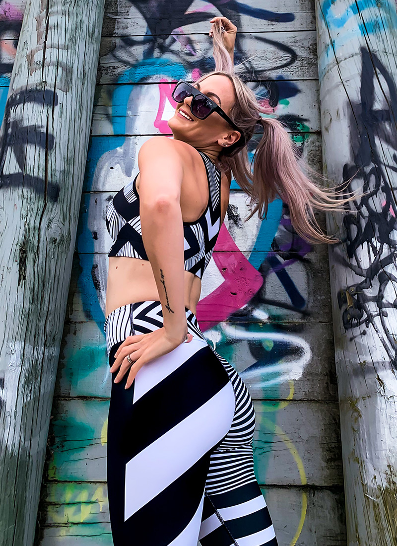 Female Model wearing black and white Zebra Yoga Leggings