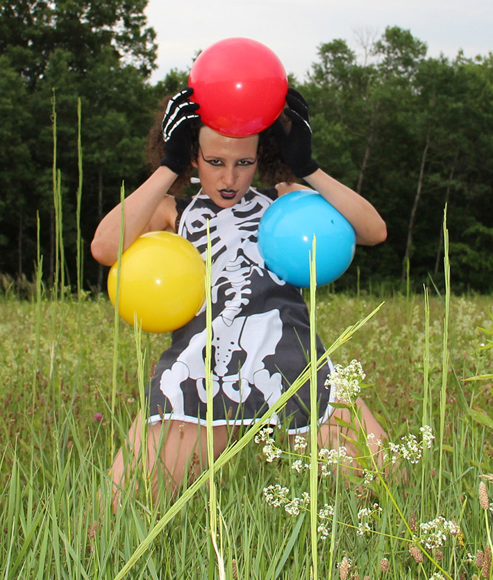 Sara Glaxia balloon photoshoot with skeleton dress