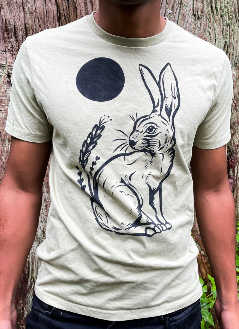 Male wearing a Sage rabbit T-shirt